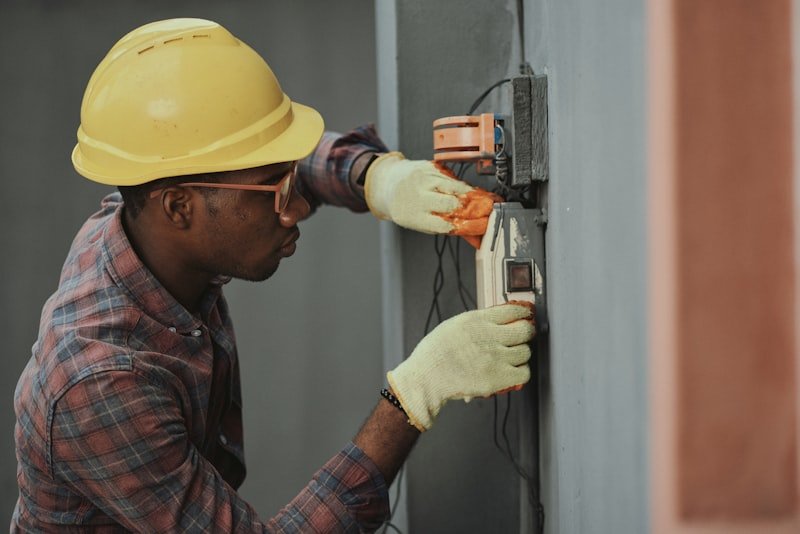 Electrician carrying out electrical work